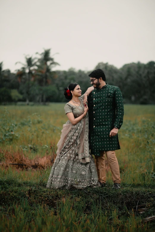 an indian bride and groom share their moment at a natural po