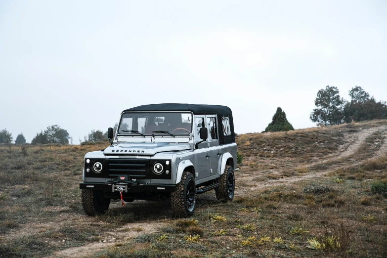 this is an image of a land rover on the grass