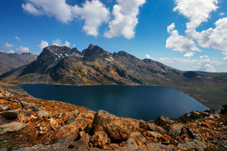 a mountain range with water in the middle