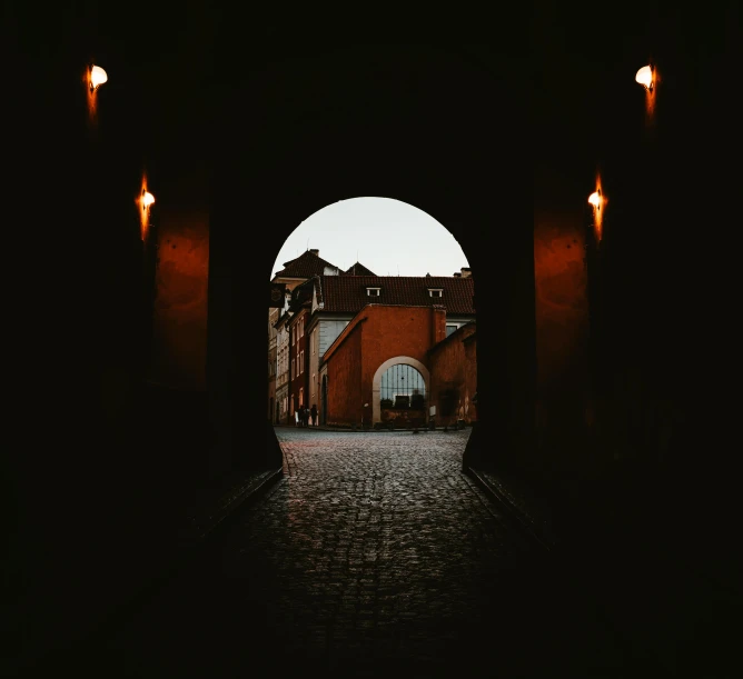 an open door leading into a dimly lit street