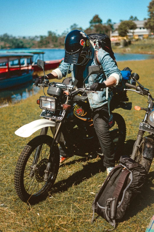 a man riding on the back of a motorcycle