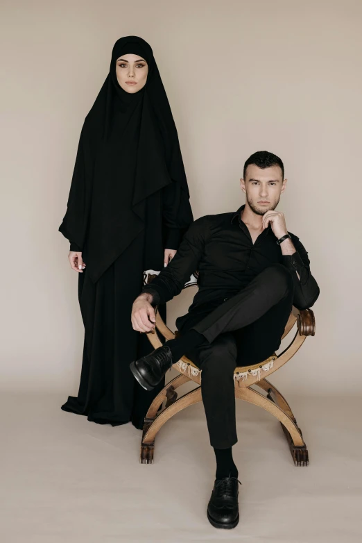 a man and woman sitting on a bench