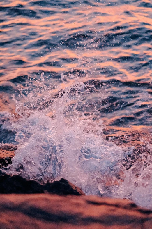 water splashing out of a small wave