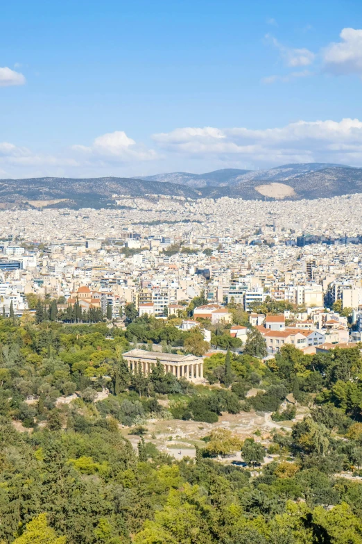 a beautiful view of a city that looks out over the landscape