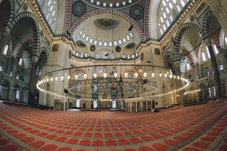 an ornate building is illuminated by chandelier