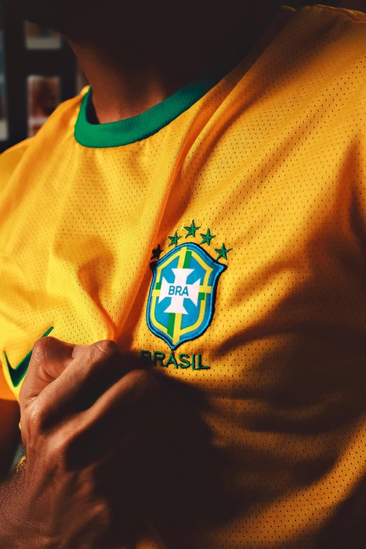 a soccer player in a jersey and a tie