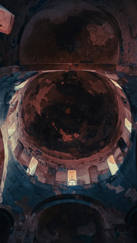 the roof of an old church with a lot of small white pillars