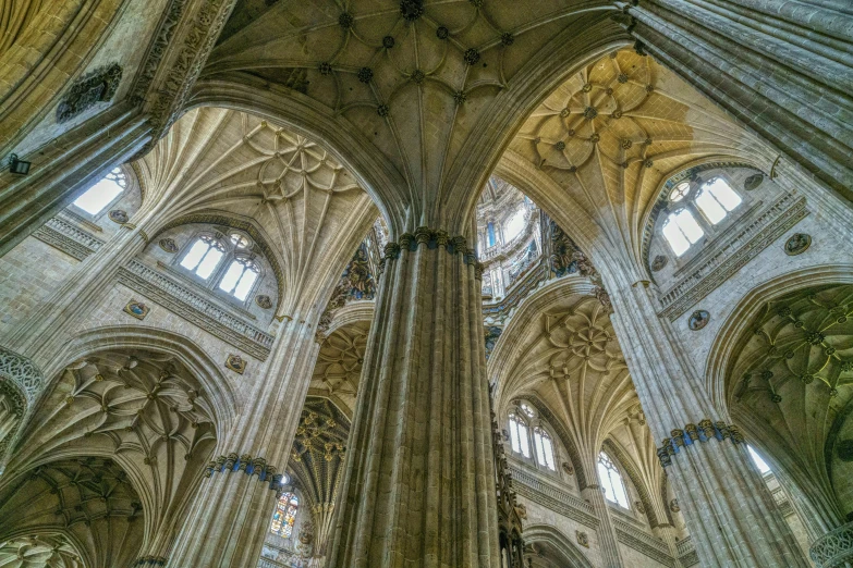 a tall cathedral with three arched windows