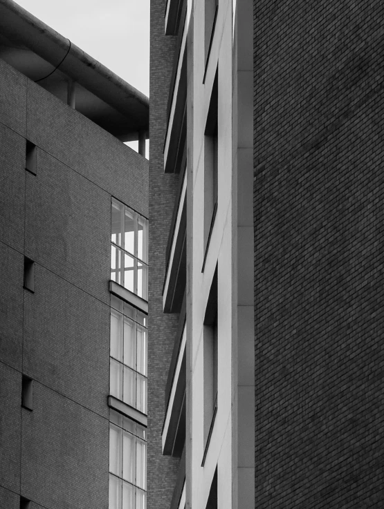 a large building with multiple windows near by