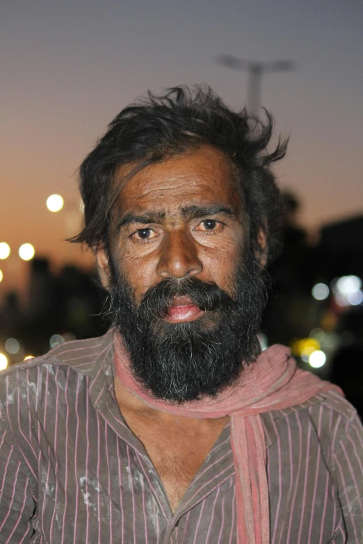 a man with a beard and beard mustache