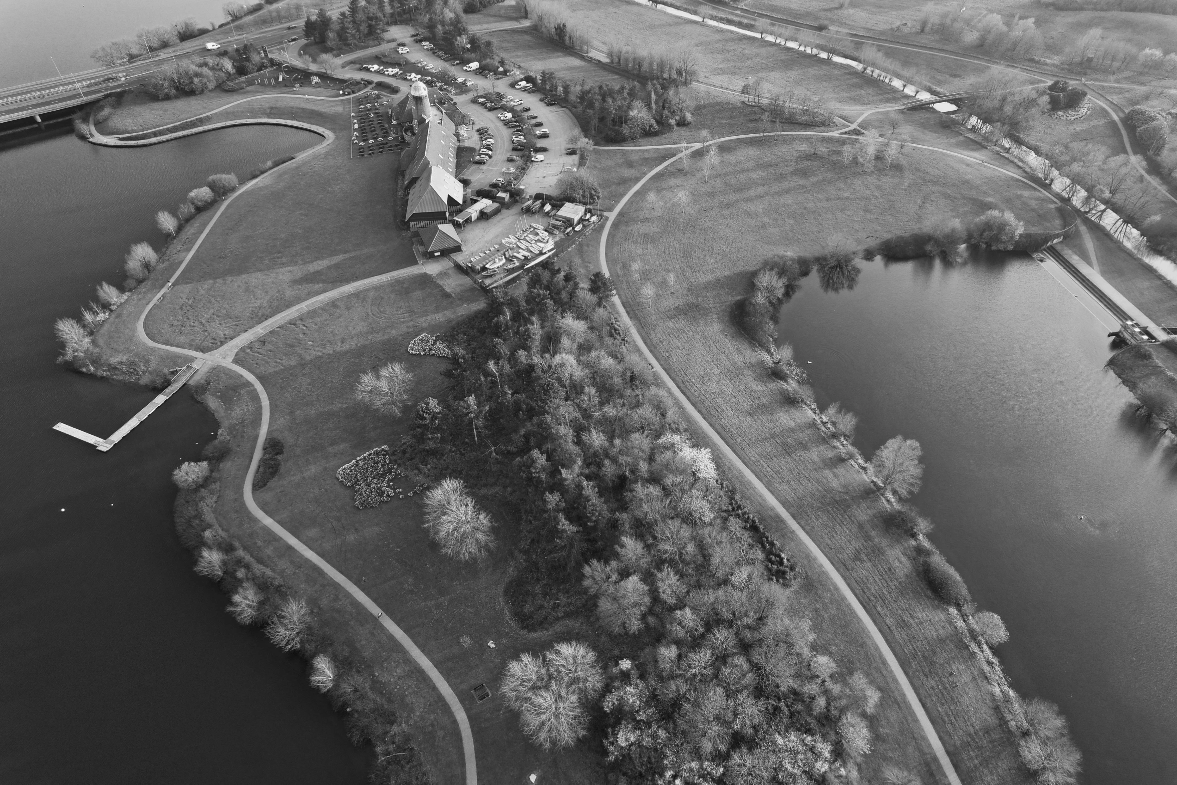 a large long path along side a large body of water