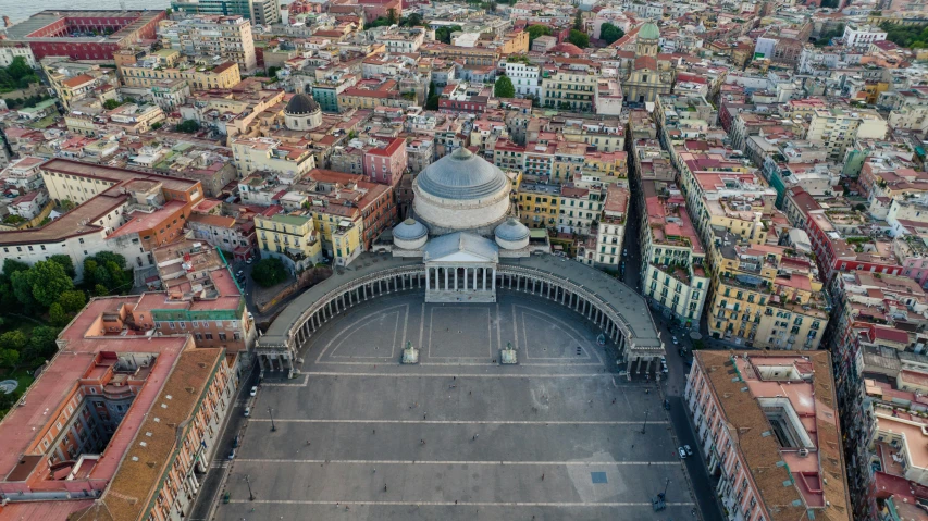 an aerial s of a city with red roofs