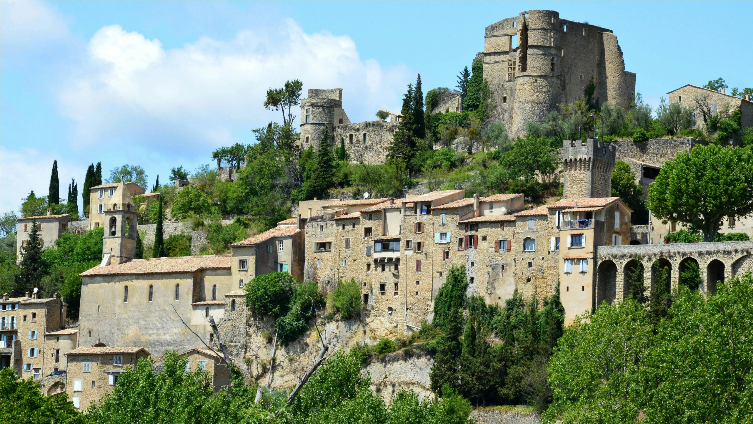 a small village on top of a rocky hill