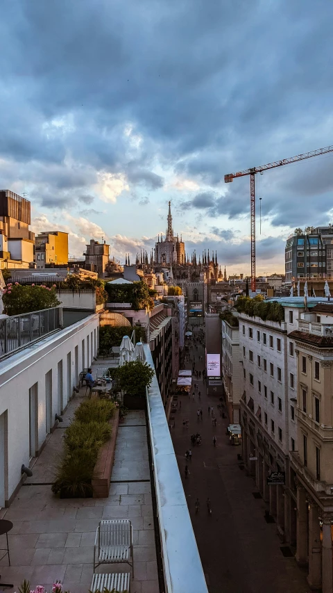 city buildings and construction cranes are shown in this image