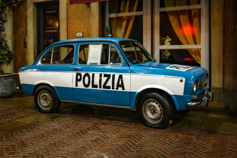 the police car is blue and white in color