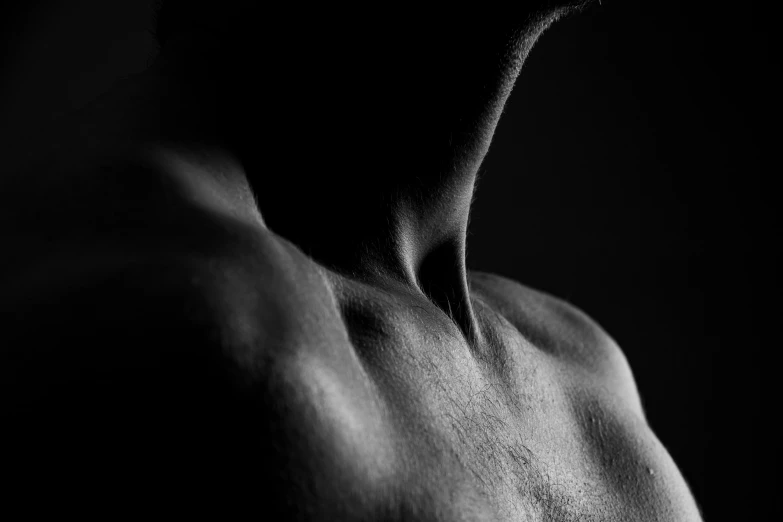 an up - close s of the back of a man's neck