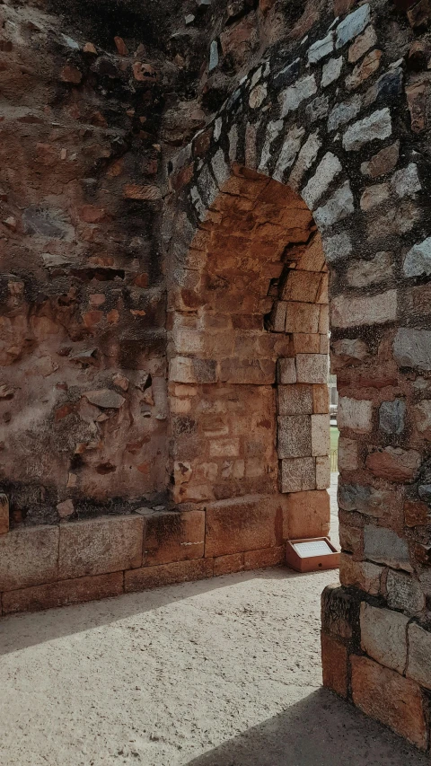 an old wall made out of bricks and stone