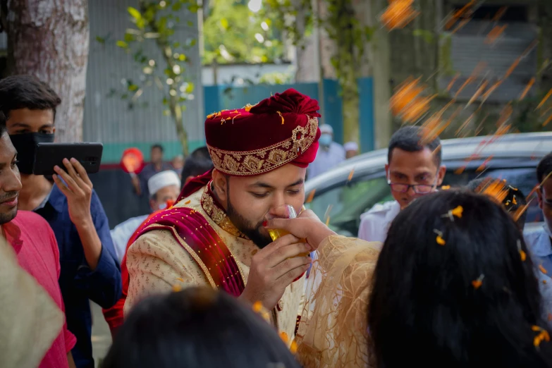 a man is getting ready to give his wife some food