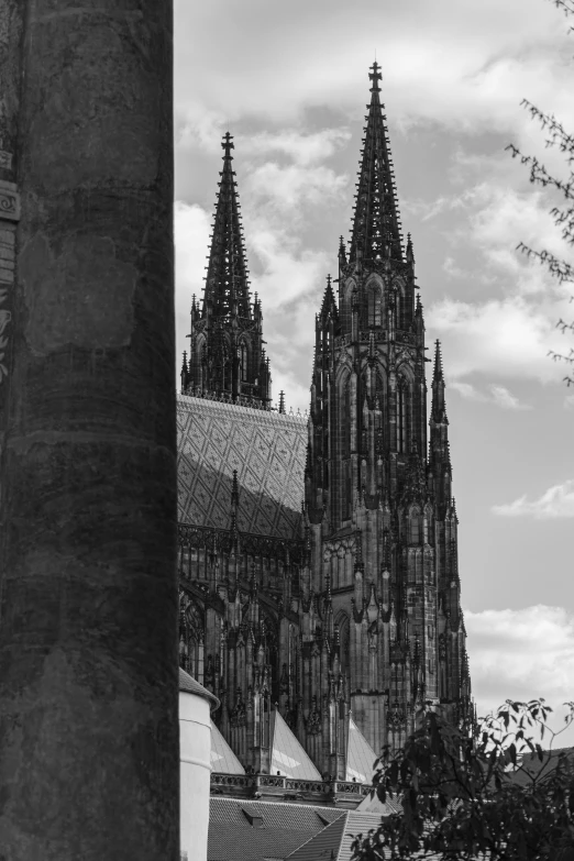 a very tall tower with many spires and a roof