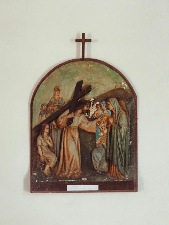 the crucifix is hung on the wall of a church