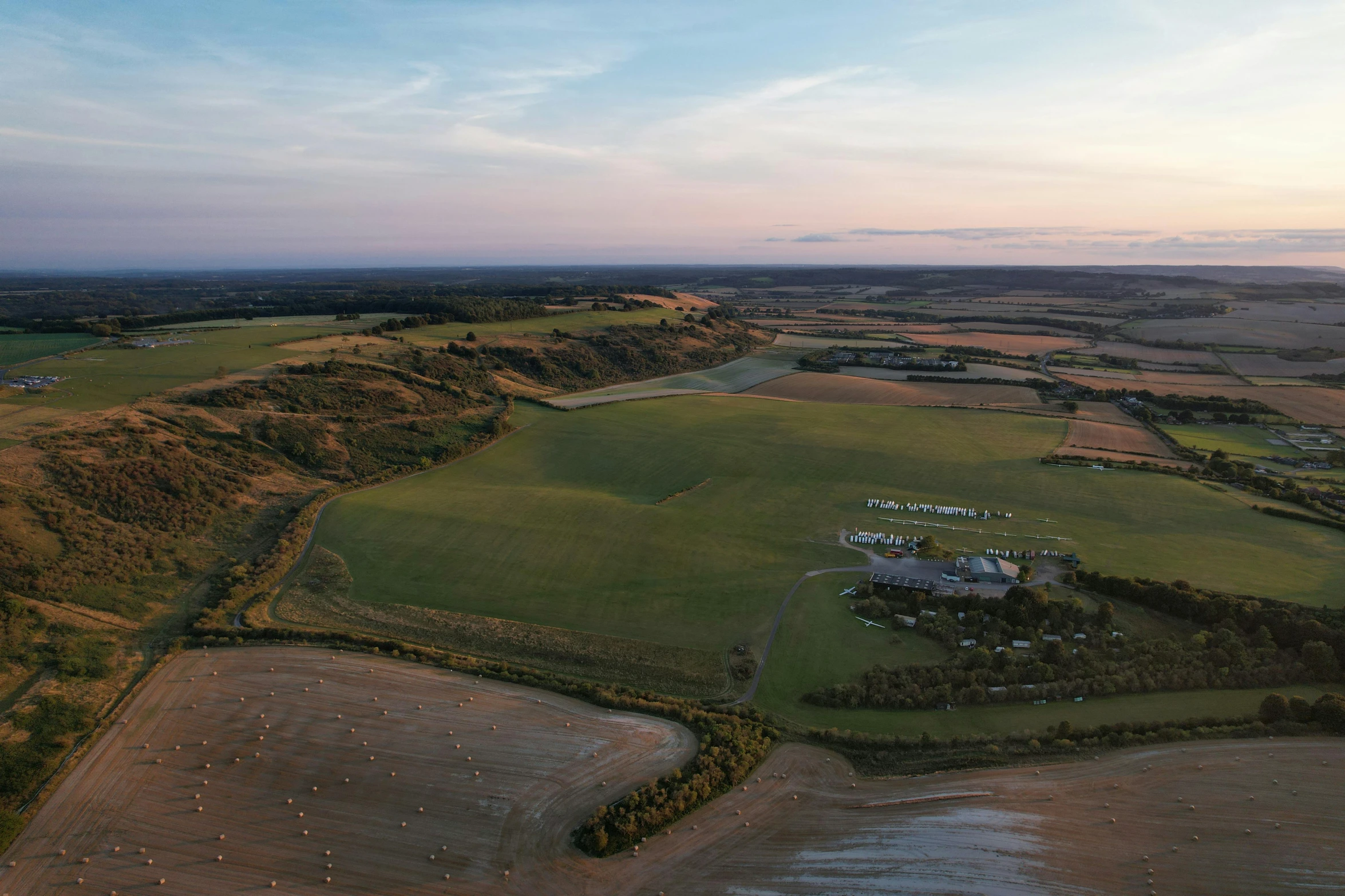 an aerial view of a large green countryside