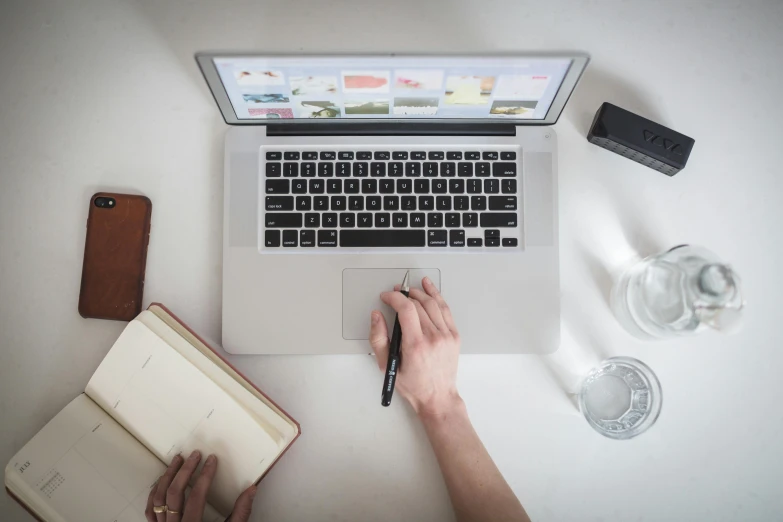 a laptop computer on top of a desk