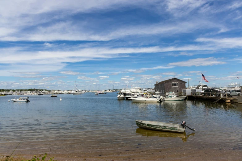 a group of boats docked at the marina