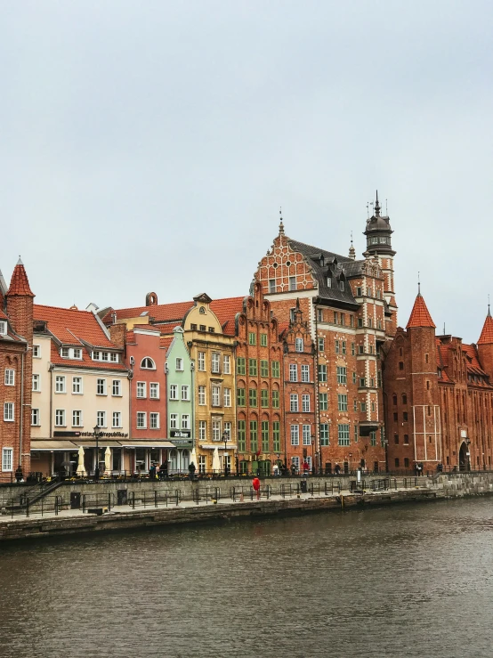 a group of buildings along the water