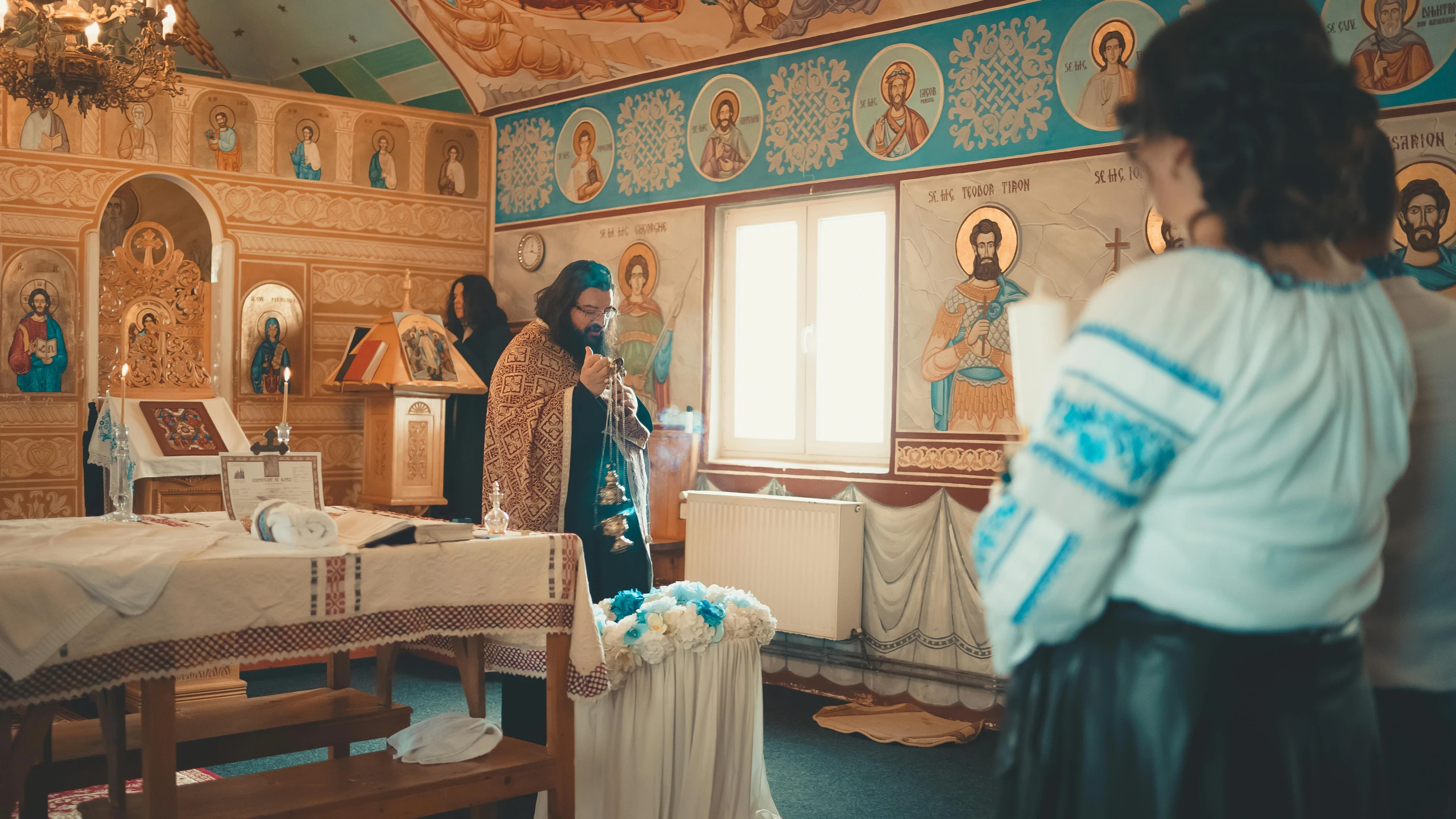 a woman is looking through an umbrella in a room with gold walls