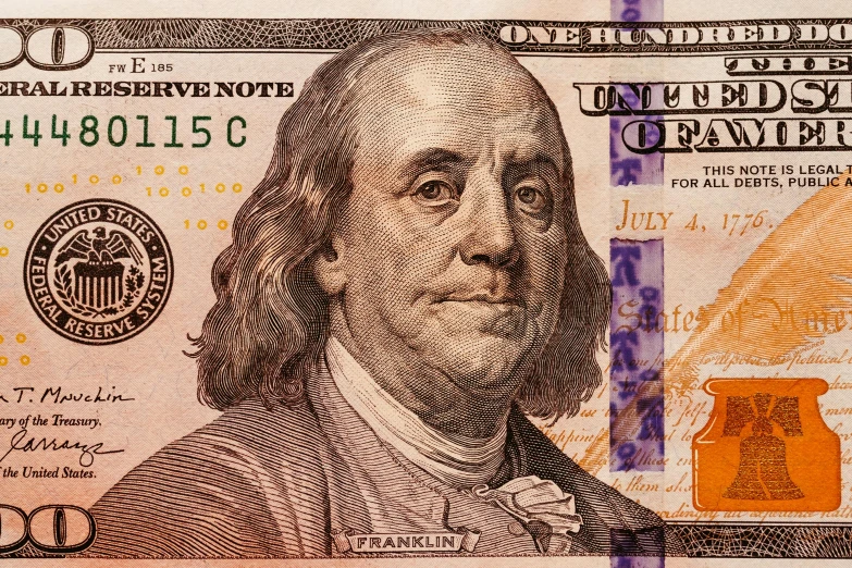 money bill with the image of president john adams