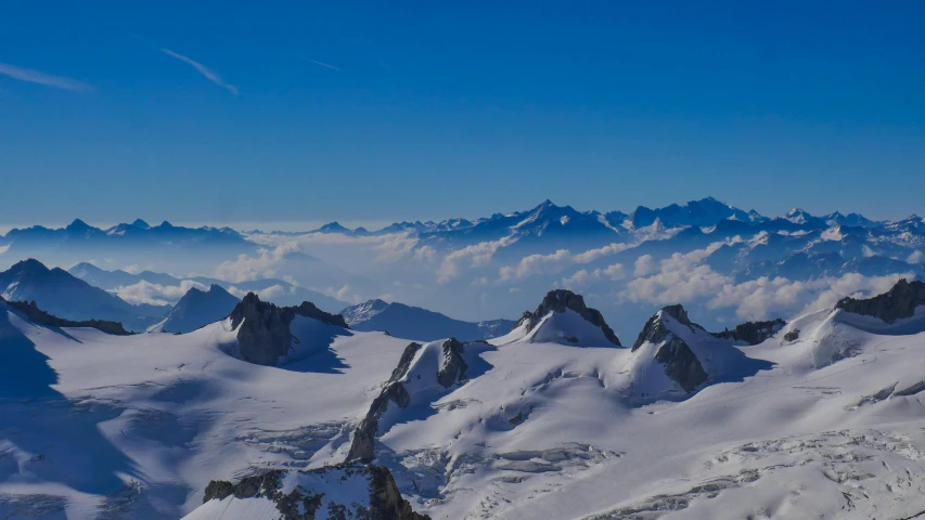 the snow covered mountains are shown with a bird's eye view