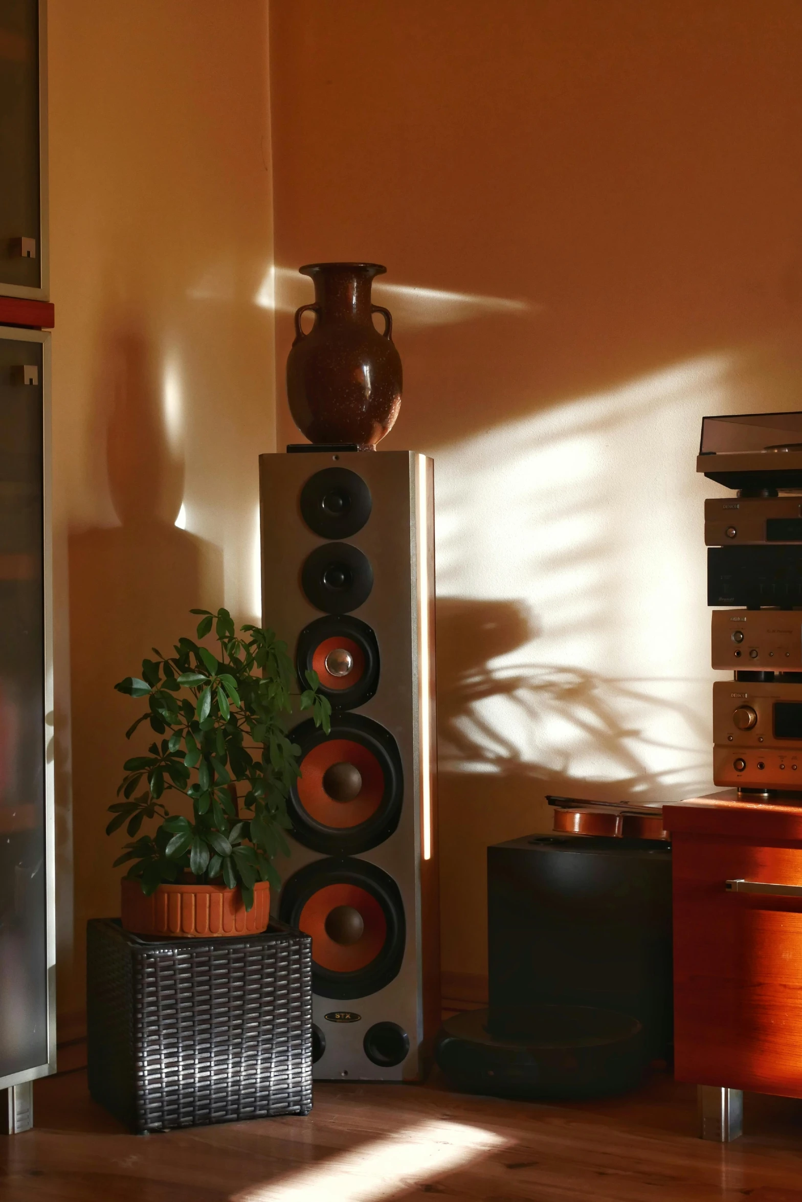 a group of speakers sit on the floor