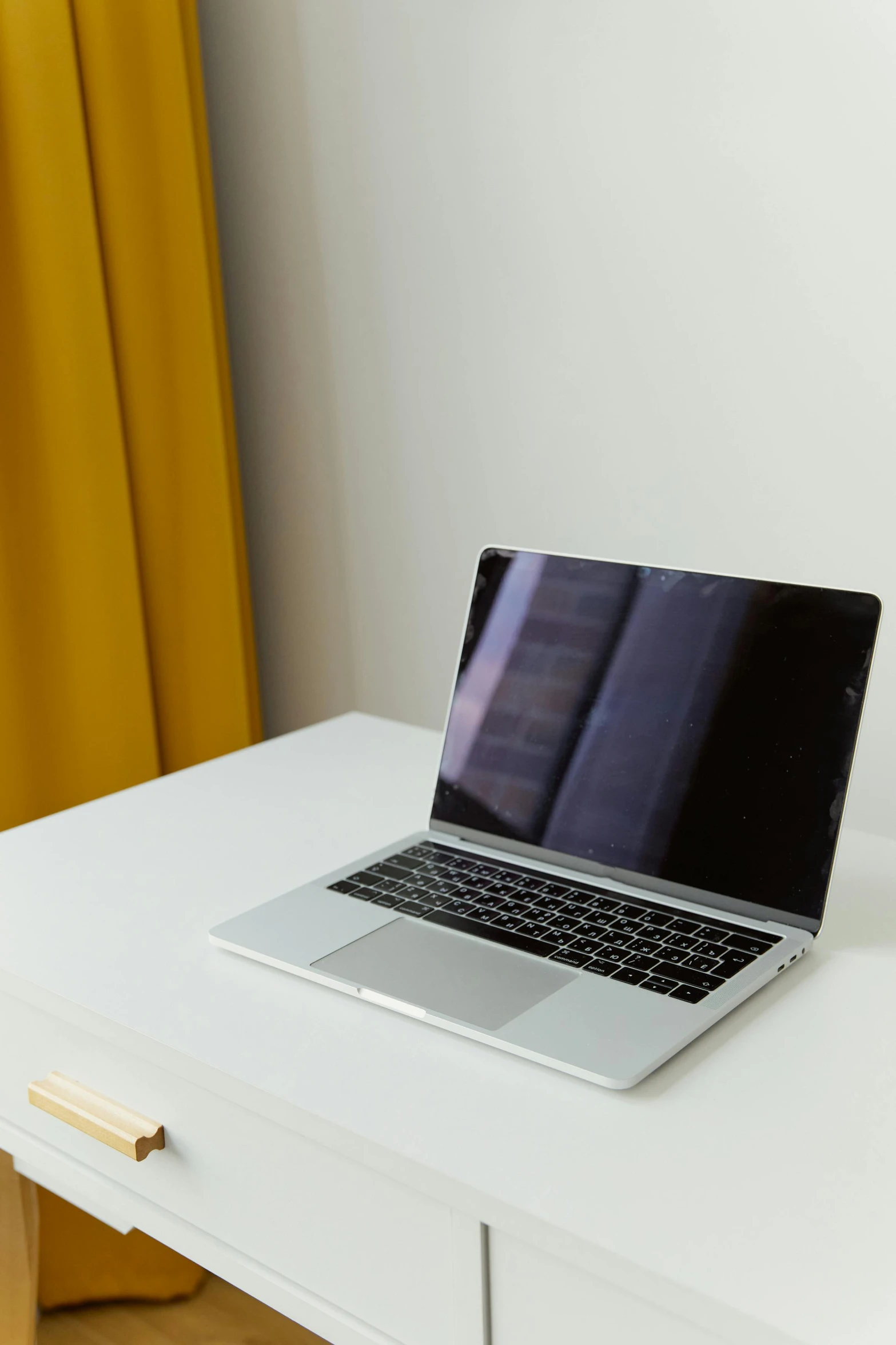 a laptop computer is sitting on a table