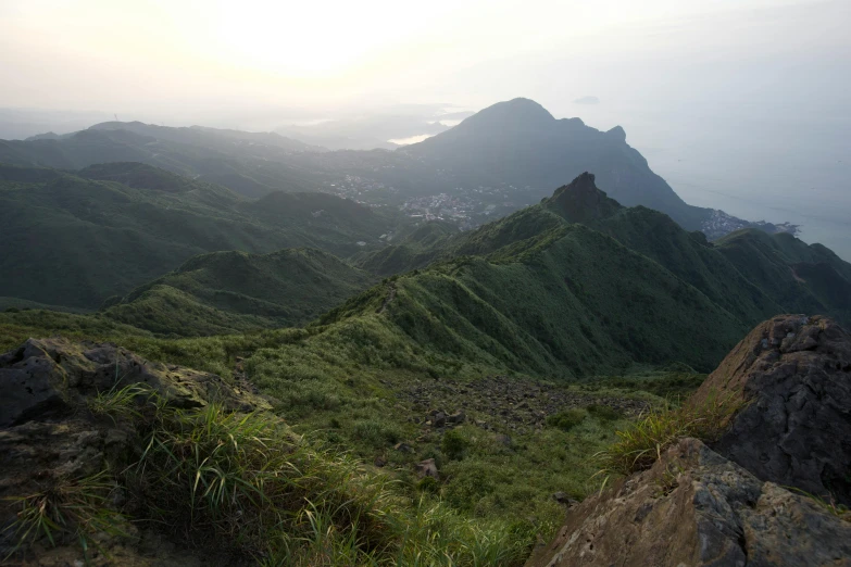 a view of a mountain with a river below it