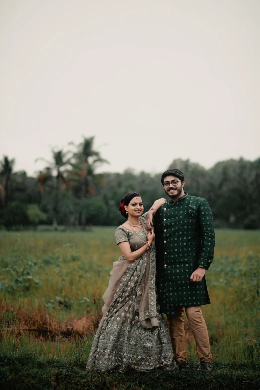 a man and woman posing for the camera