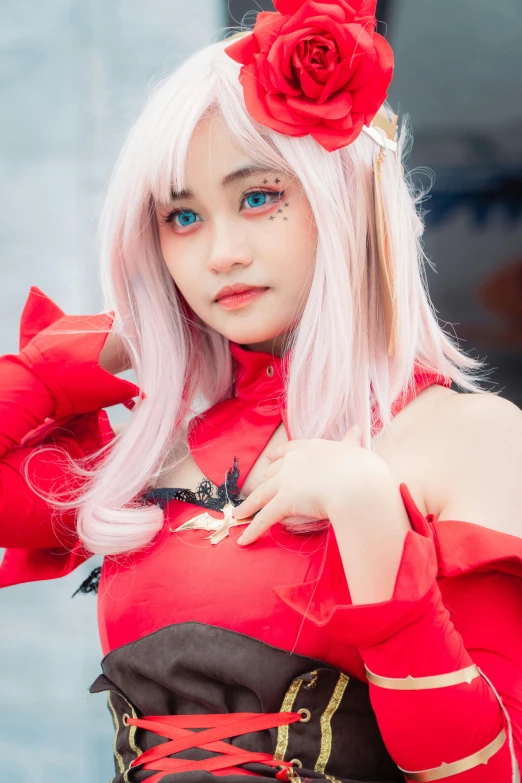 a young woman in red is dressed up as a sailor