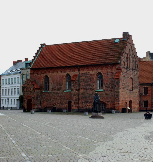 a building with a bell on the front