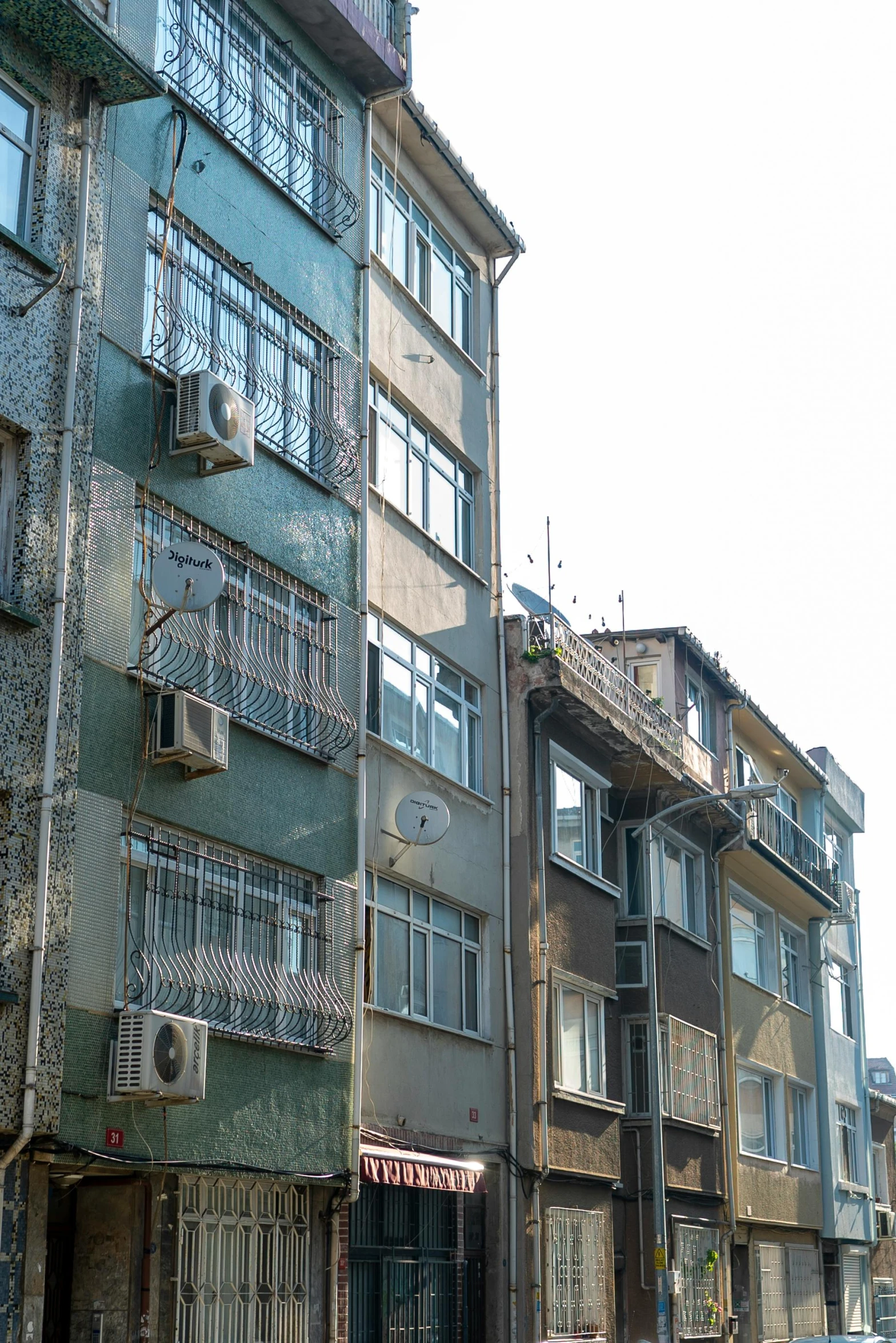 a bunch of buildings lined up next to each other