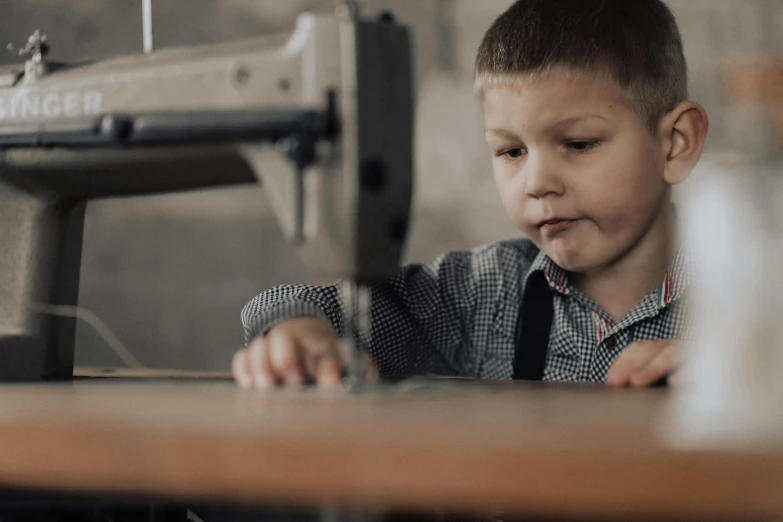 a  using a sewing machine to work on a project