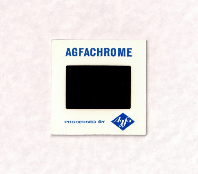 a micro camera card with a blue and white tag
