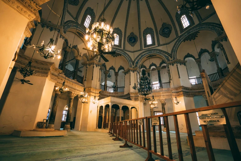 a very ornate cathedral with many windows and a staircase