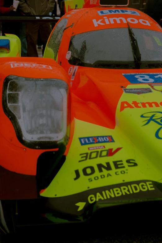 a racing car is shown parked in a lot