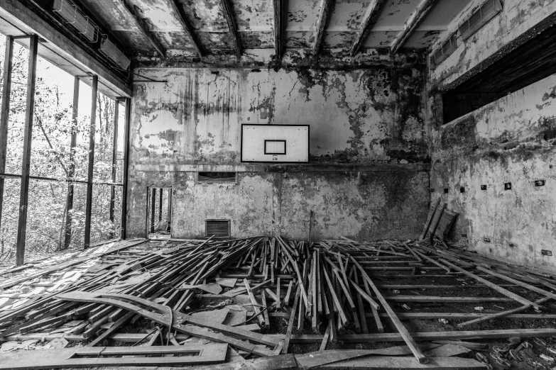 the gym is in ruins and with the basketball going up on it