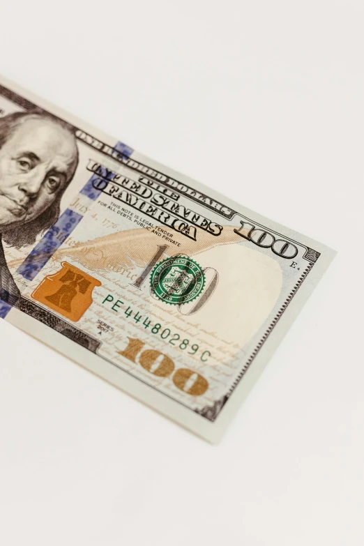 a $ 100 bill is being pographed