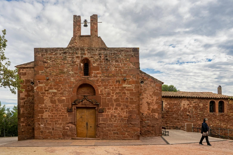 an old building with a large wooden door