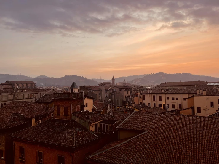 a cloudy evening in the italian country, looking over rooftops