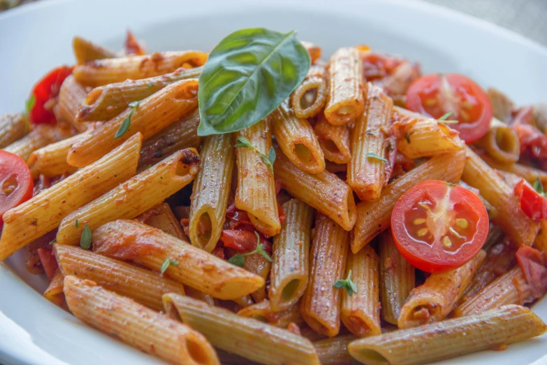 some pasta that is sitting on a plate