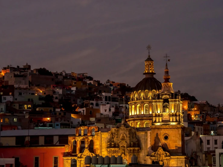 a building at dusk and the sky is visible