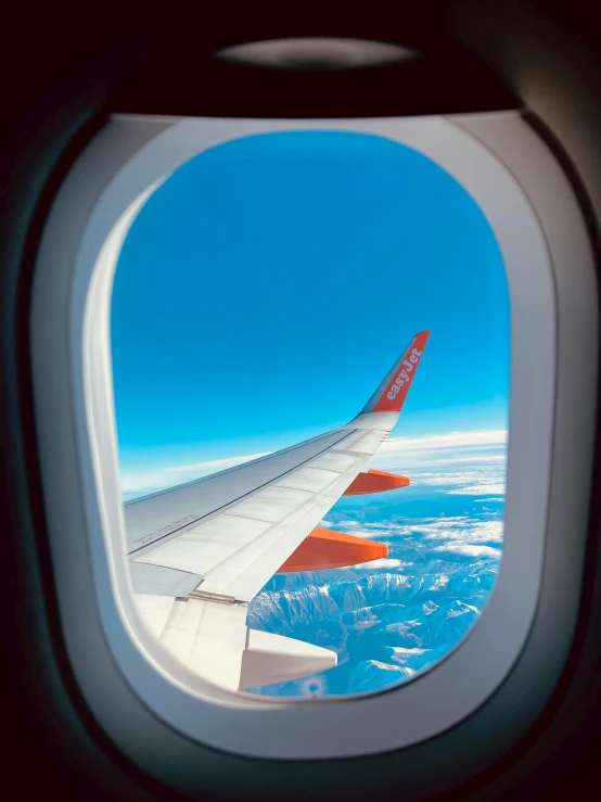 the view out an airplane window in the sky