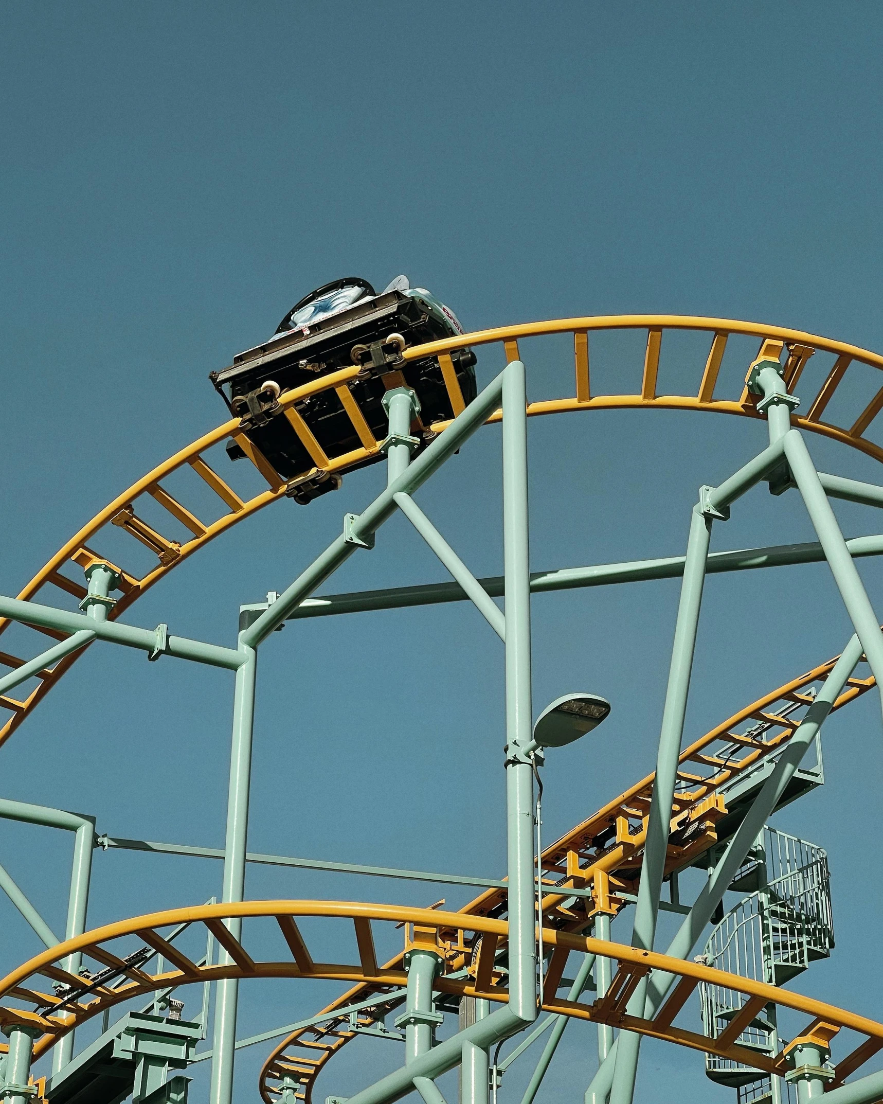 a large roller coaster ride on a cloudy day